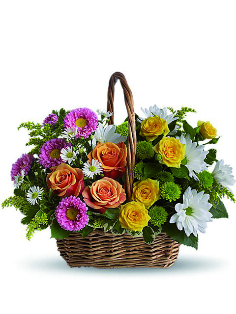 Cesto di rose gialle arancio e margherite